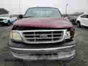 2003 Ford F-150 XL with VIN 1FTRX17283NA09956, listed as a Copart auction lot 81526395 with 195,707 mi miles and Salvage title. Bid and sale history available at DreamBid. Image 5.