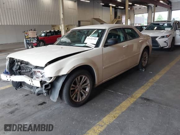 2005 Chrysler 300 300 with VIN 2C3JA43R05H604299, listed as a IAAI auction lot 43141549 with 131,677 mi miles and . Bid and sale history available at DreamBid. Image 18.