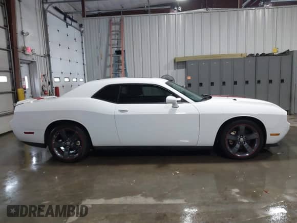 2013 Dodge Challenger SXT with VIN 2C3CDYAG8DH554016, listed as a IAAI auction lot 41275678 with 55,826 mi miles and . Bid and sale history available at DreamBid. Image 13.
