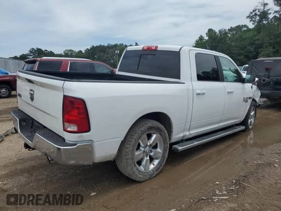 2019 Ram 1500 Big Horn with VIN 1C6RR6LT7KS675686, listed as a Copart auction lot 58254805 with 97,850 mi miles and Salvage title. Bid and sale history available at DreamBid. Image 3.