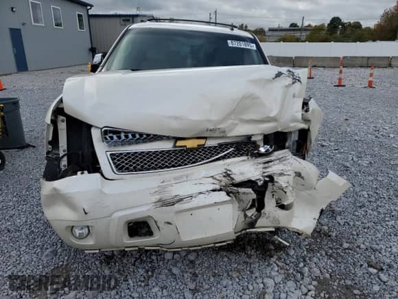 2013 Chevrolet Suburban LTZ с VIN 1GNSKKE72DR191773, выставлен на аукционе Copart как лот 87201895 с пробегом 210 253 миль миль и Списание • Salvage title. История ставок и продаж доступна на DreamBid. Изображение 5.