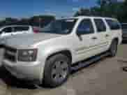 2008 Chevrolet Suburban LTZ with VIN 1GNFC16018R182031, listed as a Copart auction lot 65017175 with 157,581 mi miles and Salvage title. Bid and sale history available at DreamBid. Image 1.