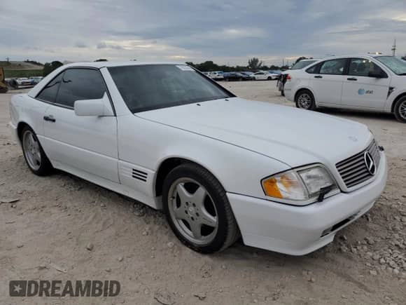 1992 Mercedes-Benz SL с VIN WDBFA66E1NF044119, выставлен на аукционе Copart как лот 78225244 с пробегом Не указан миль и Чистый • Clean title. История ставок и продаж доступна на DreamBid. Изображение 4.