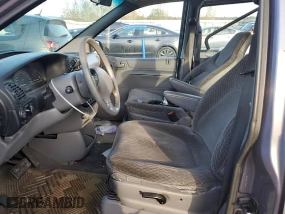 1998 Dodge Caravan with VIN 2B4FP2530WR685309, listed as a Copart auction lot 77892914 with 211,760 mi miles and Salvage title. Bid and sale history available at DreamBid. Image 7.