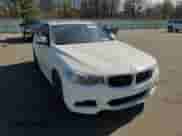 2014 BMW 3 Series 335i Gran Turismo xDrive z VIN WBA3X9C57ED153234, wystawiony jako Copart lot #46663265 z przebiegiem 189 903 mil mil oraz Szkoda całkowita • Salvage title. Historia ofert i sprzedaży dostępna na DreamBid. Obrazek 11.