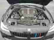 2016 BMW 5 Series 550i z VIN WBAKN9C59GD962609, wystawiony jako Copart lot #57319805 z przebiegiem 99 263 mil mil oraz Szkoda całkowita • Salvage title. Historia ofert i sprzedaży dostępna na DreamBid. Obrazek 11.