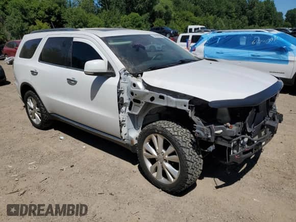 2013 Dodge Durango Crew with VIN 1C4SDJDT8DC697137, listed as a Copart auction lot 64930825 with 137,680 mi miles and Clean title. Bid and sale history available at DreamBid. Image 4.