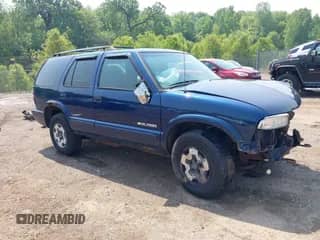 2002 Chevrolet Blazer LS z VIN 1GNDT13W12K197063, wystawiony jako IAAI lot #42436248 z przebiegiem 186 318 mil mil oraz . Historia ofert i sprzedaży dostępna na DreamBid. Obrazek 1.