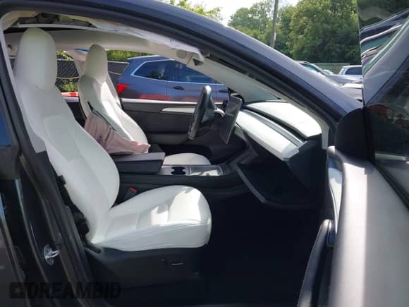 2023 Tesla Model Y Long Range z VIN 7SAYGAEE8PF880355, wystawiony jako IAAI lot #42635761 z przebiegiem 57 442 mil mil oraz . Historia ofert i sprzedaży dostępna na DreamBid. Obrazek 5.