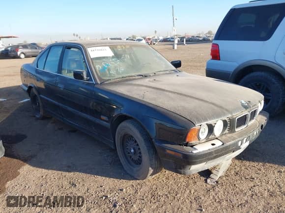 1995 BMW 5 Series z VIN WBAHE232XSGE91815, wystawiony jako IAAI lot #41526815 z przebiegiem Nie podano mil oraz . Historia ofert i sprzedaży dostępna na DreamBid. Obrazek 1.