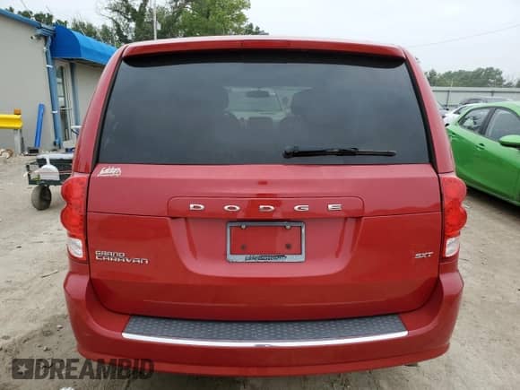 2014 Dodge Grand Caravan SXT with VIN 2C4RDGCG2ER234957, listed as a Copart auction lot 67056665 with 97,652 mi miles and Salvage title. Bid and sale history available at DreamBid. Image 6.