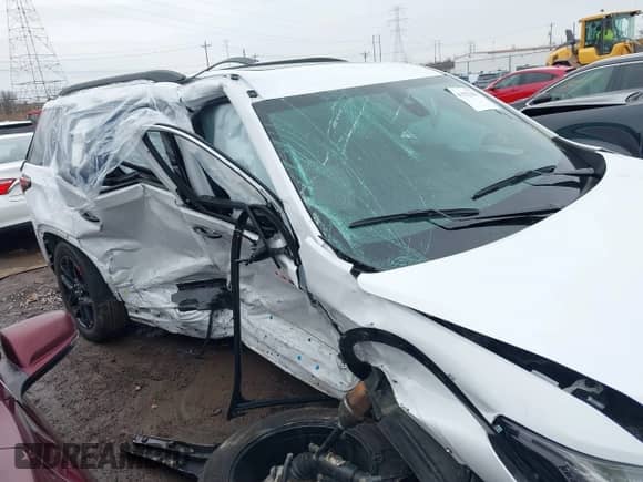 2023 Chevrolet Traverse Premier with VIN 1GNEVKKW6PJ314896, listed as a IAAI auction lot 41552390 with 25,535 mi miles and . Bid and sale history available at DreamBid. Image 6.