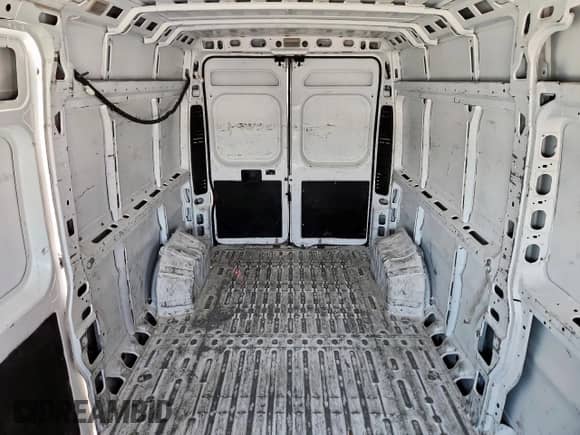 2023 Ram ProMaster Cargo с VIN 3C6LRVDG3PE583910, выставлен на аукционе Copart как лот 84949505 с пробегом 68 059 миль миль и Списание • Salvage title. История ставок и продаж доступна на DreamBid. Изображение 10.