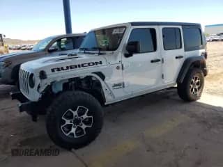 2021 Jeep Wrangler Unlimited Rubicon with VIN 1C4HJXFN2MW656294, listed as a Copart auction lot 64179825 with 62,138 mi miles and Salvage title. Bid and sale history available at DreamBid. Image 1.