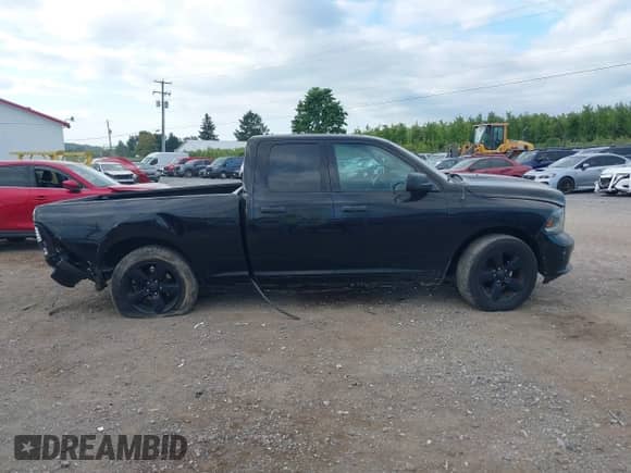 2015 Ram 1500 Tradesman with VIN 1C6RR6FT9FS582802, listed as a IAAI auction lot 43109428 with 125,719 mi miles and . Bid and sale history available at DreamBid. Image 13.