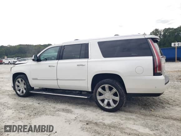 2018 Cadillac Escalade ESV Premium Luxury with VIN 1GYS3JKJ7JR211036, listed as a Copart auction lot 73703594 with 114,317 mi miles and Salvage title. Bid and sale history available at DreamBid. Image 2.