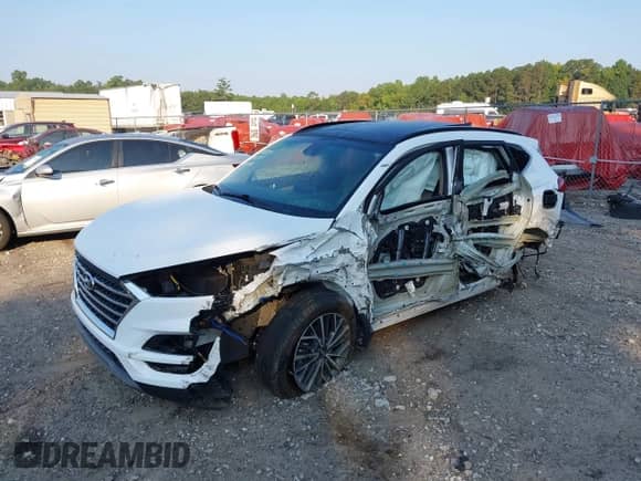 2020 Hyundai Tucson Sport with VIN KM8J33AL2LU132322, listed as a IAAI auction lot 43151648 with 44,500 mi miles and . Bid and sale history available at DreamBid. Image 2.