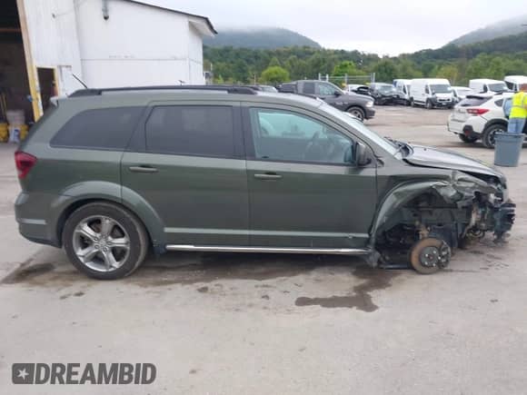 2016 Dodge Journey Crossroad Plus with VIN 3C4PDDGG7GT165022, listed as a IAAI auction lot 43026166 with 107,841 mi miles and . Bid and sale history available at DreamBid. Image 14.