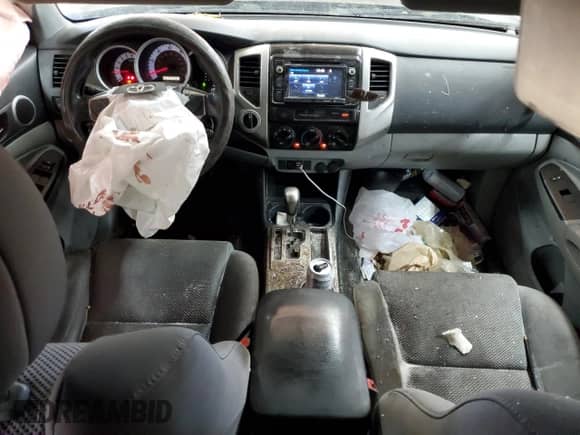 2015 Toyota Tacoma с VIN 3TMLU4EN6FM182712, выставлен на аукционе Copart как лот 83875505 с пробегом 271 991 миль миль и Списание • Salvage title. История ставок и продаж доступна на DreamBid. Изображение 8.