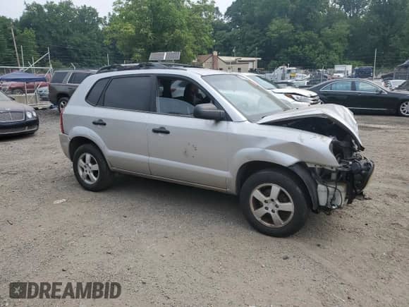 2006 Hyundai Tucson GL z VIN KM8JM12B26U457662, wystawiony jako Copart lot #65556975 z przebiegiem 167 127 mil mil oraz Nie do naprawy • Non repairable. Historia ofert i sprzedaży dostępna na DreamBid. Obrazek 4.