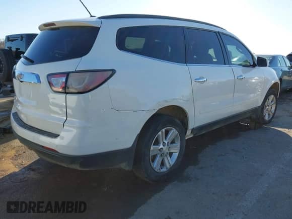 2013 Chevrolet Traverse LT z VIN 1GNKVJKD4DJ192000, wystawiony jako IAAI lot #41653233 z przebiegiem 249 929 mil mil oraz . Historia ofert i sprzedaży dostępna na DreamBid. Obrazek 4.