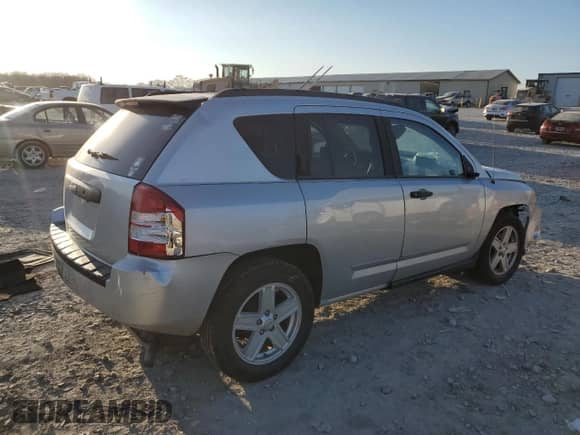 2010 Jeep Compass Sport z VIN 1J4NT1FB9AD626226, wystawiony jako Copart lot #82933784 z przebiegiem 191 772 mil mil oraz Szkoda całkowita • Salvage title. Historia ofert i sprzedaży dostępna na DreamBid. Obrazek 3.