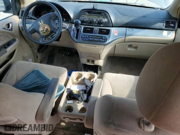 2006 Honda Odyssey EX z VIN 5FNRL38416B437734, wystawiony jako Copart lot #64601665 z przebiegiem 235 453 mil mil oraz Szkoda całkowita • Salvage title. Historia ofert i sprzedaży dostępna na DreamBid. Obrazek 8.