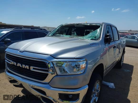 2020 Ram 1500 Big Horn z VIN 1C6RREFG7LN333762, wystawiony jako IAAI lot #42258907 z przebiegiem 51 558 mil mil oraz . Historia ofert i sprzedaży dostępna na DreamBid. Obrazek 6.