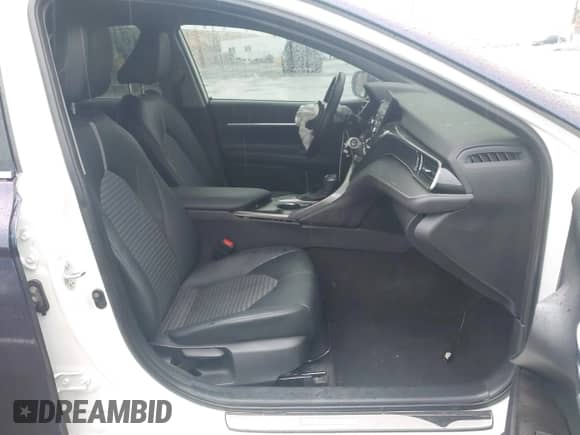 2023 Toyota Camry SE with VIN 4T1G11AK3PU753019, listed as a IAAI auction lot 43250757 with 34,297 mi miles and . Bid and sale history available at DreamBid. Image 5.