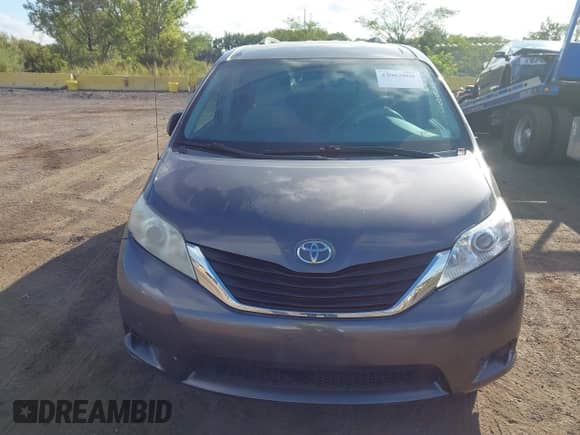 2012 Toyota Sienna LE AAS with VIN 5TDKK3DC2CS215910, listed as a IAAI auction lot 43063000 with 169,580 mi miles and . Bid and sale history available at DreamBid. Image 12.