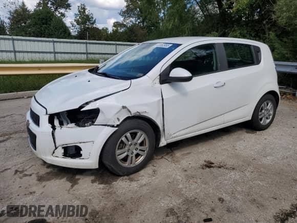 2013 Chevrolet Sonic LT with VIN 1G1JC6SG9D4206806, listed as a Copart auction lot 83852955 with 144,636 mi miles and Salvage title. Bid and sale history available at DreamBid. Image 1.