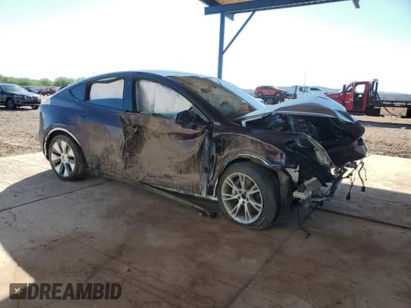 2021 Tesla Model Y Long Range with VIN 5YJYGDEEXMF213751, listed as a Copart auction lot 84984465 with 52,995 mi miles and Salvage title. Bid and sale history available at DreamBid. Image 4.