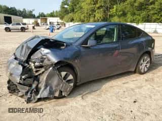 2023 Tesla Model Y Long Range with VIN 7SAYGAEE4PF668889, listed as a Copart auction lot 67239314 with 26,874 mi miles and Salvage title. Bid and sale history available at DreamBid. Image 1.