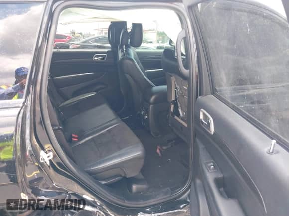 2021 Jeep Grand Cherokee Laredo E with VIN 1C4RJEAG7MC844473, listed as a IAAI auction lot 42319716 with 90,449 mi miles and . Bid and sale history available at DreamBid. Image 8.