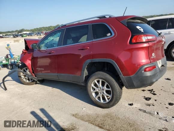 2014 Jeep Cherokee Latitude with VIN 1C4PJMCB4EW198361, listed as a Copart auction lot 71474555 with 134,717 mi miles and Salvage title. Bid and sale history available at DreamBid. Image 2.
