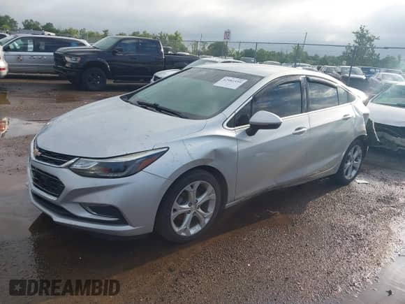 2017 Chevrolet Cruze Premier z VIN 1G1BF5SM0H7263153, wystawiony jako IAAI lot #42981559 z przebiegiem 165 451 mil mil oraz . Historia ofert i sprzedaży dostępna na DreamBid. Obrazek 2.