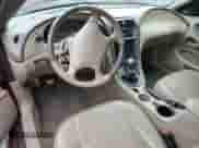 2004 Ford Mustang Standard z VIN 1FAFP40484F109752, wystawiony jako Copart lot #84595275 z przebiegiem 60 910 mil mil oraz Szkoda całkowita • Salvage title. Historia ofert i sprzedaży dostępna na DreamBid. Obrazek 8.