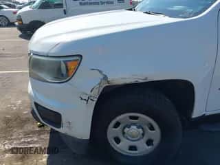 2016 Chevrolet Colorado 2WD WT z VIN 1GCHSBEA6G1384090, wystawiony jako IAAI lot #43258936 z przebiegiem 101 027 mil mil oraz . Historia ofert i sprzedaży dostępna na DreamBid. Obrazek 6.