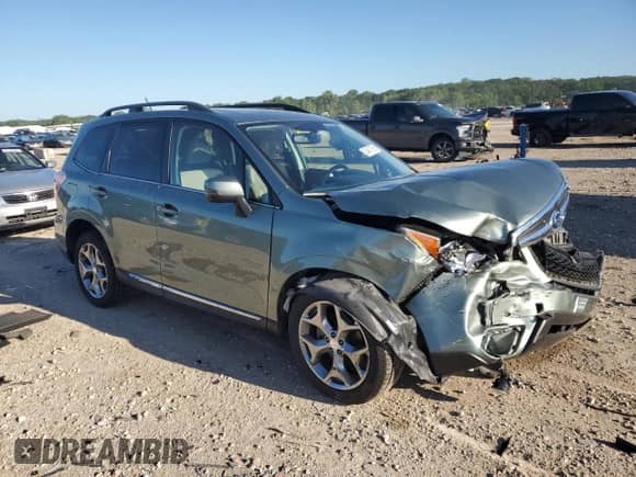2015 Subaru Forester Touring with VIN JF2SJAUC5FH469225, listed as a Copart auction lot 63457395 with 50,814 mi miles and Salvage title. Bid and sale history available at DreamBid. Image 4.
