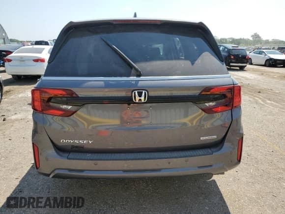 2025 Honda Odyssey Touring с VIN 5FNRL6H80SB014352, выставлен на аукционе Copart как лот 67280185 с пробегом Не указан миль и Списание • Salvage title. История ставок и продаж доступна на DreamBid. Изображение 6.