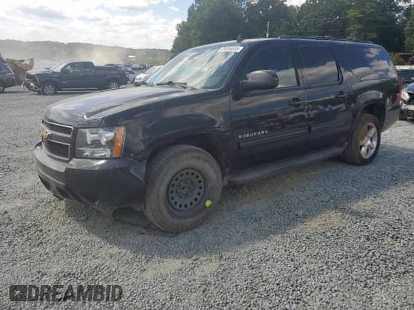 2012 Chevrolet Suburban LT with VIN 1GNSCJE00CR101481, listed as a Copart auction lot 69094655 with 174,206 mi miles and Salvage title. Bid and sale history available at DreamBid. Image 1.