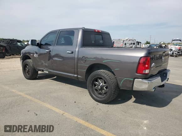 2015 Ram 1500 Big Horn with VIN 1C6RR7LT4FS687760, listed as a Copart auction lot 70958935 with 118,516 mi miles and Salvage title. Bid and sale history available at DreamBid. Image 2.