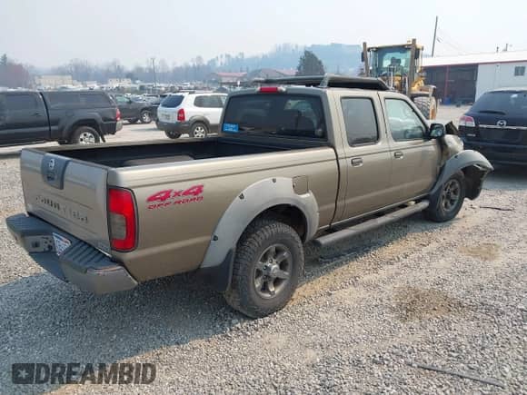 2002 Nissan Frontier XE with VIN 1N6ED29YX2C369056, listed as a IAAI auction lot 41899906 with 186,823 mi miles and . Bid and sale history available at DreamBid. Image 4.