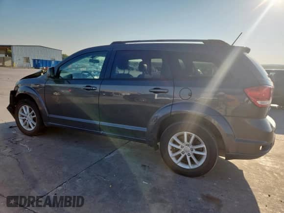2017 Dodge Journey SXT with VIN 3C4PDCBG7HT589514, listed as a Copart auction lot 80213035 with 147,824 mi miles and Salvage title. Bid and sale history available at DreamBid. Image 2.