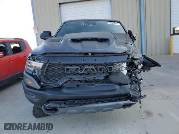 2022 Ram 1500 TRX z VIN 1C6SRFU97NN269348, wystawiony jako Copart lot #86330345 z przebiegiem 104 965 mil mil oraz Szkoda całkowita • Salvage title. Historia ofert i sprzedaży dostępna na DreamBid. Obrazek 5.