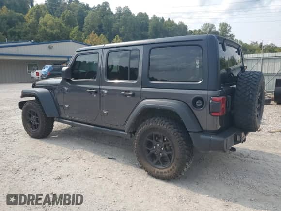 2021 Jeep Wrangler Unlimited 80th Anniversary with VIN 1C4HJXDG0MW777068, listed as a Copart auction lot 71477785 with 44,109 mi miles and Salvage title. Bid and sale history available at DreamBid. Image 2.