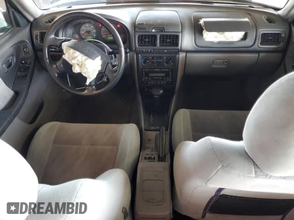 2002 Subaru Forester S with VIN JF1SF65602H712543, listed as a Copart auction lot 67325015 with 214,238 mi miles and Salvage title. Bid and sale history available at DreamBid. Image 8.