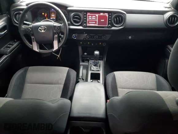 2020 Toyota Tacoma SR5 с VIN 3TMBZ5DN2LM025694, выставлен на аукционе Copart как лот 86754834 с пробегом 72 459 миль миль и Списание • Salvage title. История ставок и продаж доступна на DreamBid. Изображение 8.