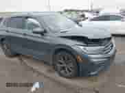 2023 Volkswagen Tiguan SE with VIN 3VV3B7AX4PM095392, listed as a IAAI auction lot 42830053 with 14,674 mi miles and . Bid and sale history available at DreamBid. Image 1.