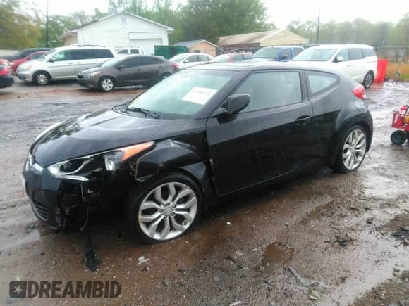 2012 Hyundai Veloster w/Gray Int z VIN KMHTC6AD2CU024382, wystawiony jako IAAI lot #41980192 z przebiegiem 46 684 mil mil oraz . Historia ofert i sprzedaży dostępna na DreamBid. Obrazek 2.